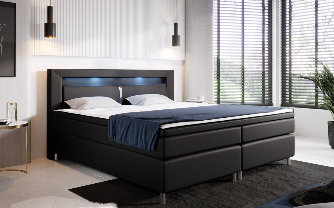 Lit boxspring Hypnos avec éclairages LED et pieds chromés